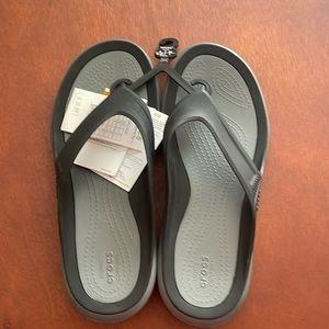 Men’s Crocs black flip flops